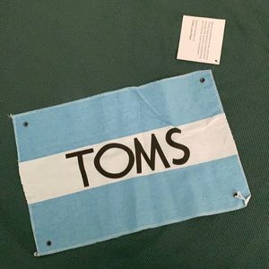 TOMS flag & sticker